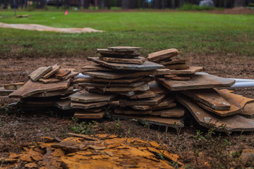 Pile of natural flagstone material used in landscaping and hardscaping projects