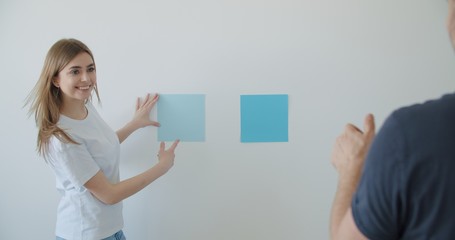 couple choosing wall paint color