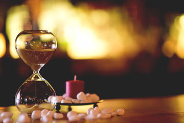hourglass on wine table