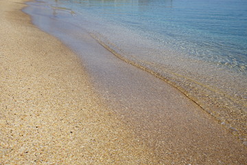 calm clear sea and sandy beach