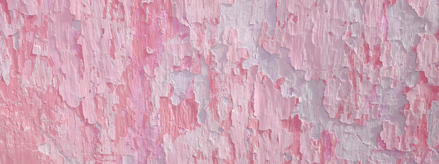old peeling pink stucco wall, long banner