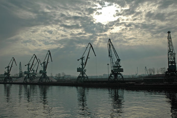 Fototapeta na wymiar cranes in harbor