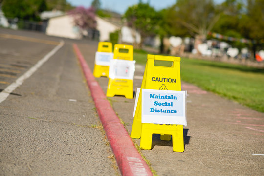 Social Distancing Curbside Sign At School