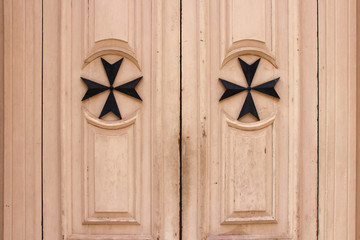 door of an oratory in vittoriosa in malta - obrazy, fototapety, plakaty