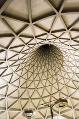 Vicenza, Italy, in the Sun Village, december 2017. Interior view of the interesting small San Carlo church, an architectural concrete experimentation with a curious roof structure in a spiral shape