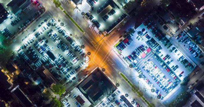 NIGHT_Aerial Motion Timelapse (Hyperlapse) High Wide Intersection with Traffic and Lights