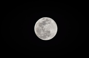 full moon on black background
