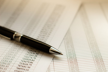 black pen on a sheet of paper with numbers