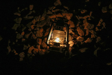 A view of a lantern on rocks