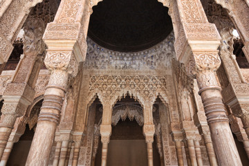 Detail of arabesques arches in the Alhambra, Granada, Spain