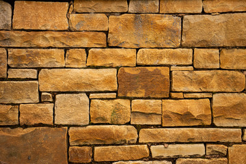 Sandstone block wall texture.