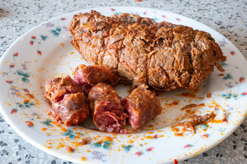 Ragù, classic Italian Bolognese meat cooked in a wood-burning fireplace