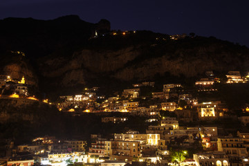landscape of the night city of Positano in Italy