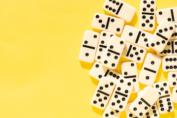 domino pieces on the yellow background