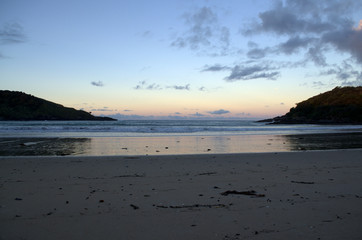 Sunset at the pacific ocean North Island New Zealand