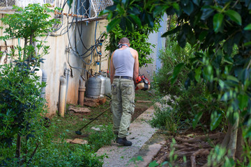 man working in garden