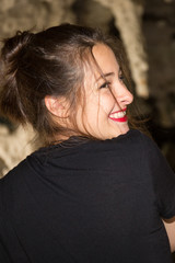 Trendy girl posing smiling positive young woman having fun in city street background with red lips