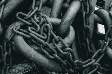 black and white photo, old chains from ships