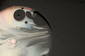 Abstract background. Blot painting marble texture. Acrylic color in water and oil.