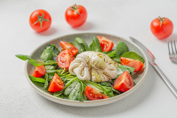 Burrata cheese. Salad with Italian burrata cheese, balsamic and cherry tomatoes.