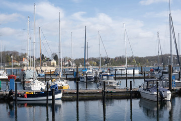 Fototapeta na wymiar yachts stand at the port in a European city