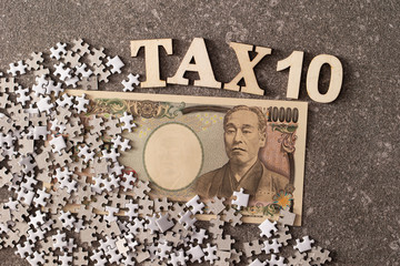 Tax word and Japanese money