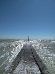 man walking on the beach