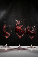 wine splash wtih black background