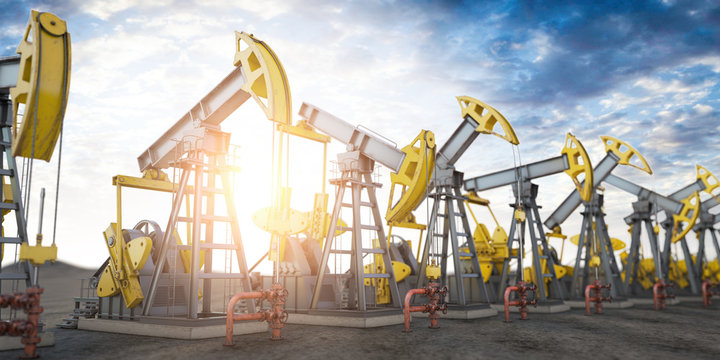 Oil pump jack imn a row. Oil production and extraction concept.