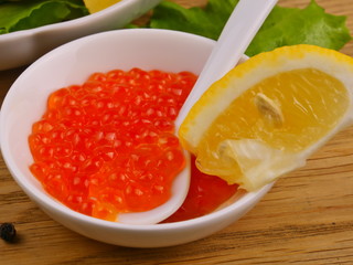 red caviar in a spoon