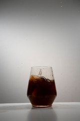 juice splash in a drinking glass