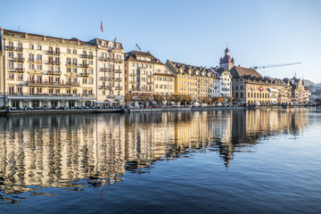 Fototapeta na wymiar Lucerne reflected in the water in a sunny day