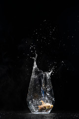 lemon water splash in a drinking glas