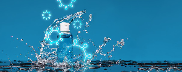 Bottle of antiseptic gel in splashes of water. Concept of washing hand, hygiene.