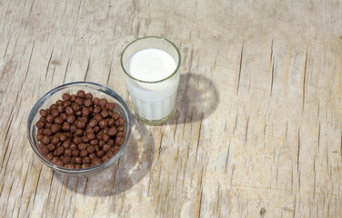 Breakfast of sweet cereals with milk