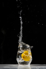 lemon water splash in a drinking glas