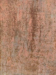 Rusty metal background with streaks of rust. Rust stains. Rystycorrosion. Corroded metal background.