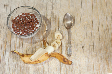 Breakfast milk with cereal and banana