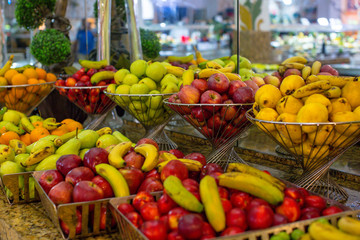 Assortment of different kind of fruits on the table in buffet. Buffet breakfast. Groups of buffet in the restaurant. Detail of a beautiful fruits buffet with a rich choice, healthy food.
