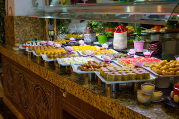 Traditional Turkish sweets at the open buffet in a hotel in Turkey