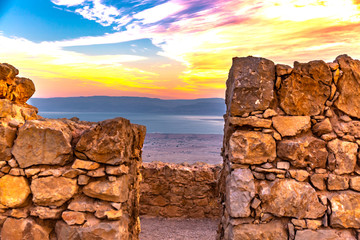 sunrise over ancient Masada fortress in Israel - obrazy, fototapety, plakaty