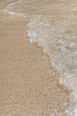 beautiful ocean wave on sandy beach. Background.