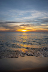 Obraz premium The quiet sea at sunset.
