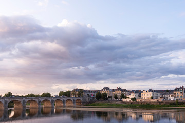 Fototapeta premium Exterior view of the beautiful city of Saumur with its castle in the Loire Valley, France (Europe)