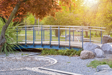 Metal bridge in park in Nuremberg in spring