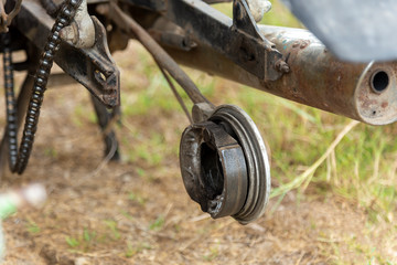 Motorcycle brake parts that are damaged awaiting repair