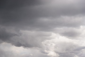 Dramatic gray clouds in the sky. Gray and white cloudy sky