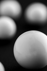 white pearl on black background