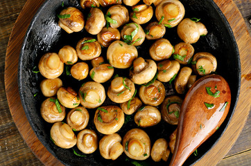 Fried mushrooms in frying pan