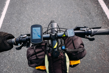 tourist bike steering wheel with backpacks and map in iceland navigator number one highway